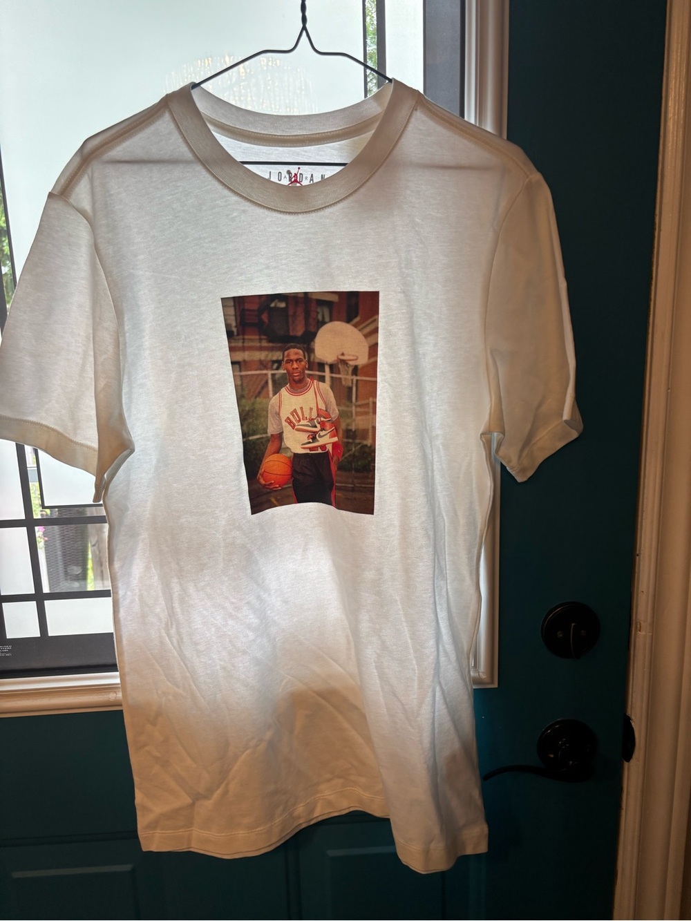 Jordan White Short Sleeve Graphic Tee with Red Accent